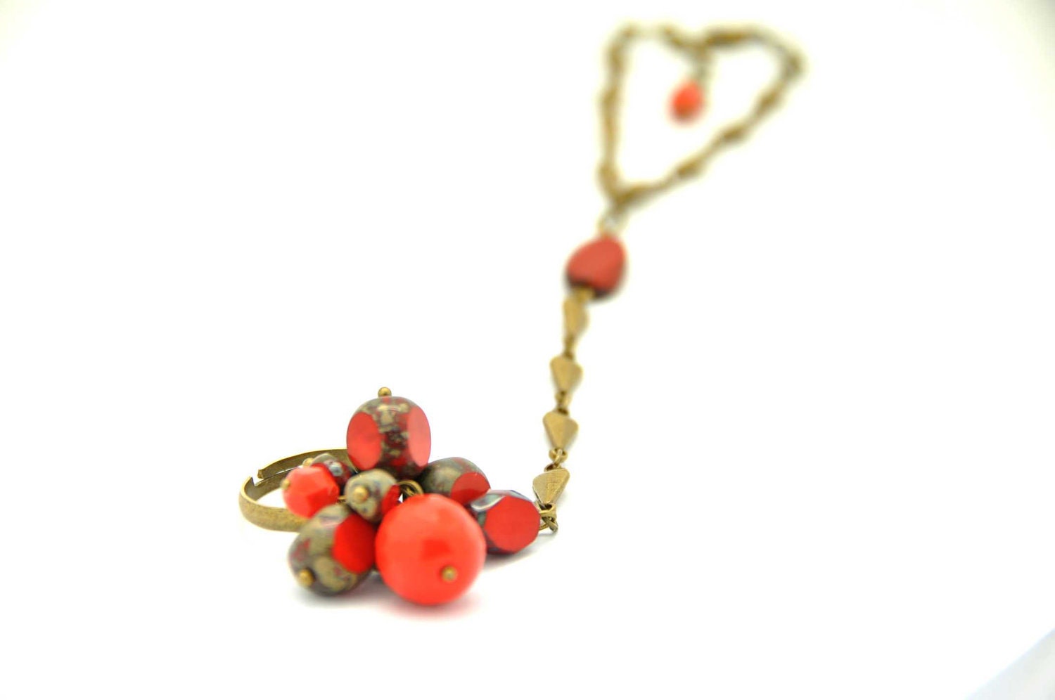 Fabulous ring bracelet, made with red coral czech picasso glass beads, a delicate antique brass chain