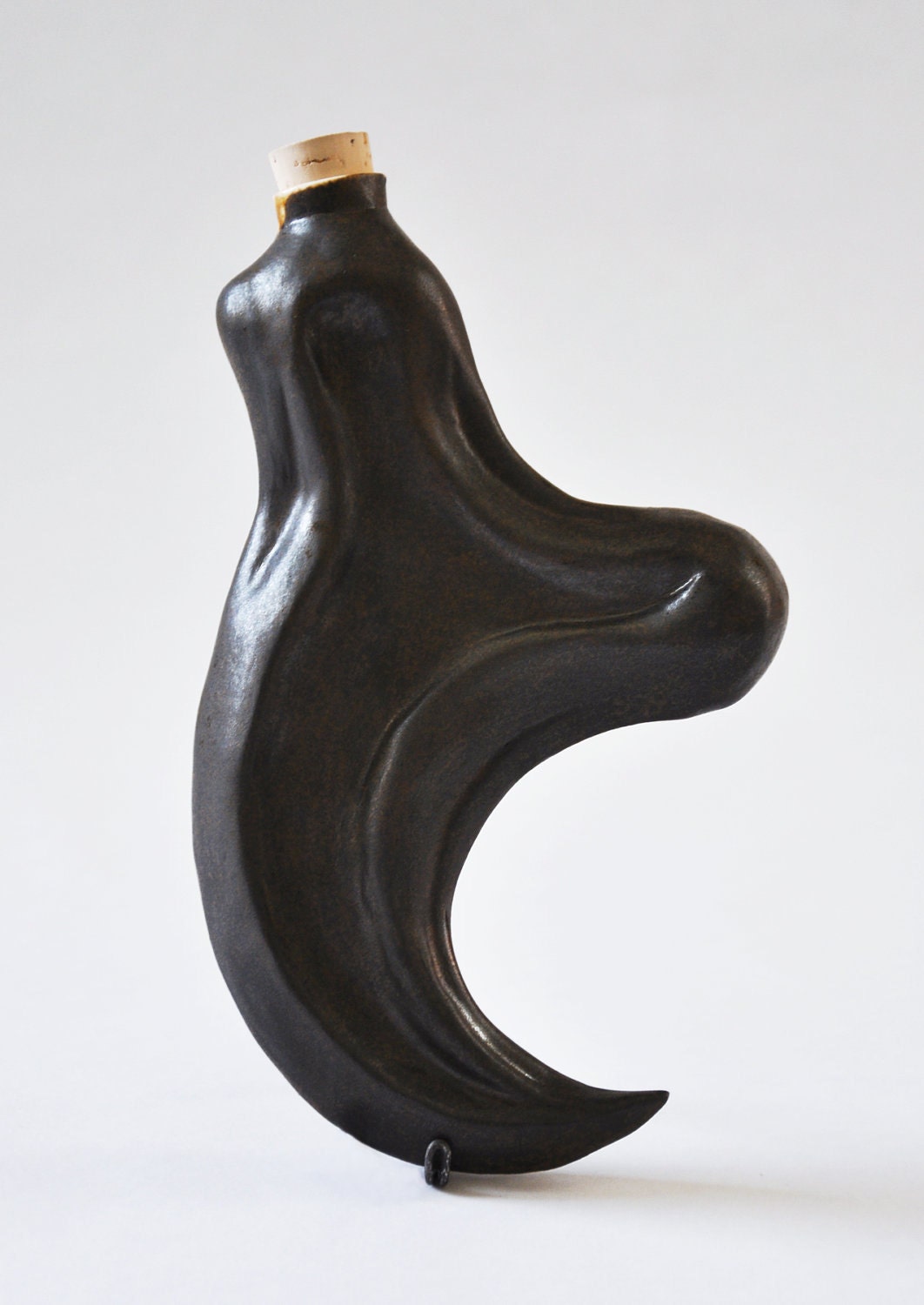 Porcelain Velociraptor Claw Flask