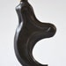 Porcelain Velociraptor Claw Flask