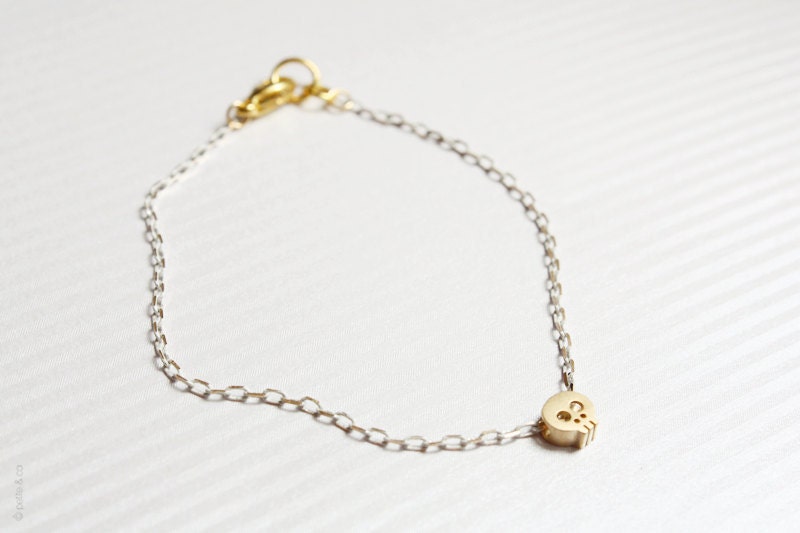 tiny skull bracelet - matt 14k gold plated skull on WHITE and golden chain