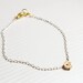 tiny skull bracelet - matt 14k gold plated skull on WHITE and golden chain