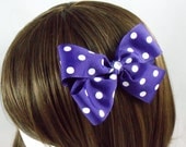 Hair bow 5 in. Purple bow with white dots and white gem center