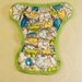 Diaper cover with snaps, made with 100% polyester knit PUL fabric. YOU PICK size.