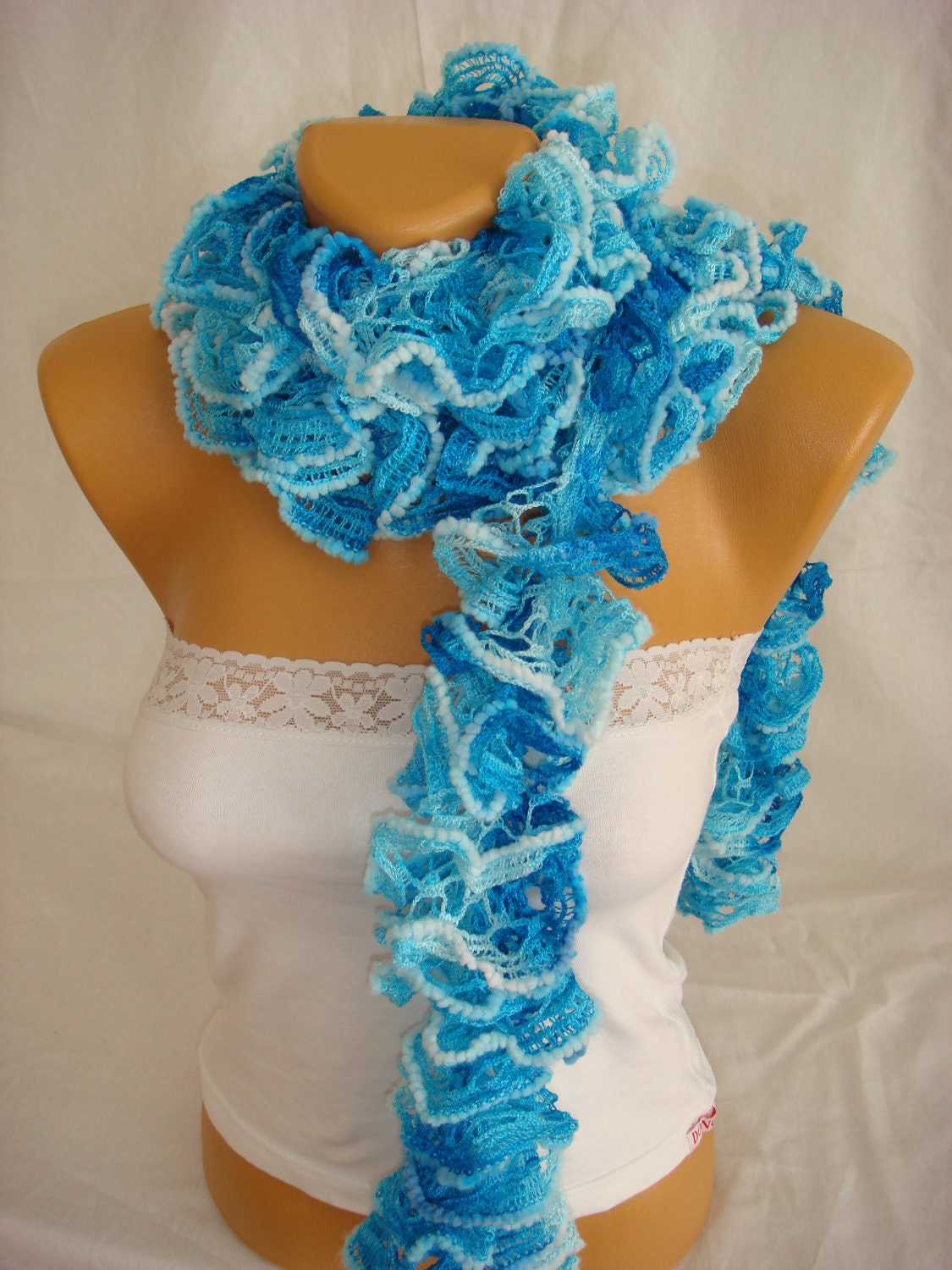 Hand knitted sky blue ruffled scarf
