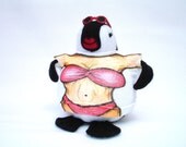 Plush penguin toy in a summer tourist tee with sunglasses