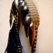 Ostrich black feather ,vintage multicolouerd brass beads headpiece