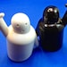 Ceramic 'Pik Me' Salt and Pepper Shakers. Cute and modern.
