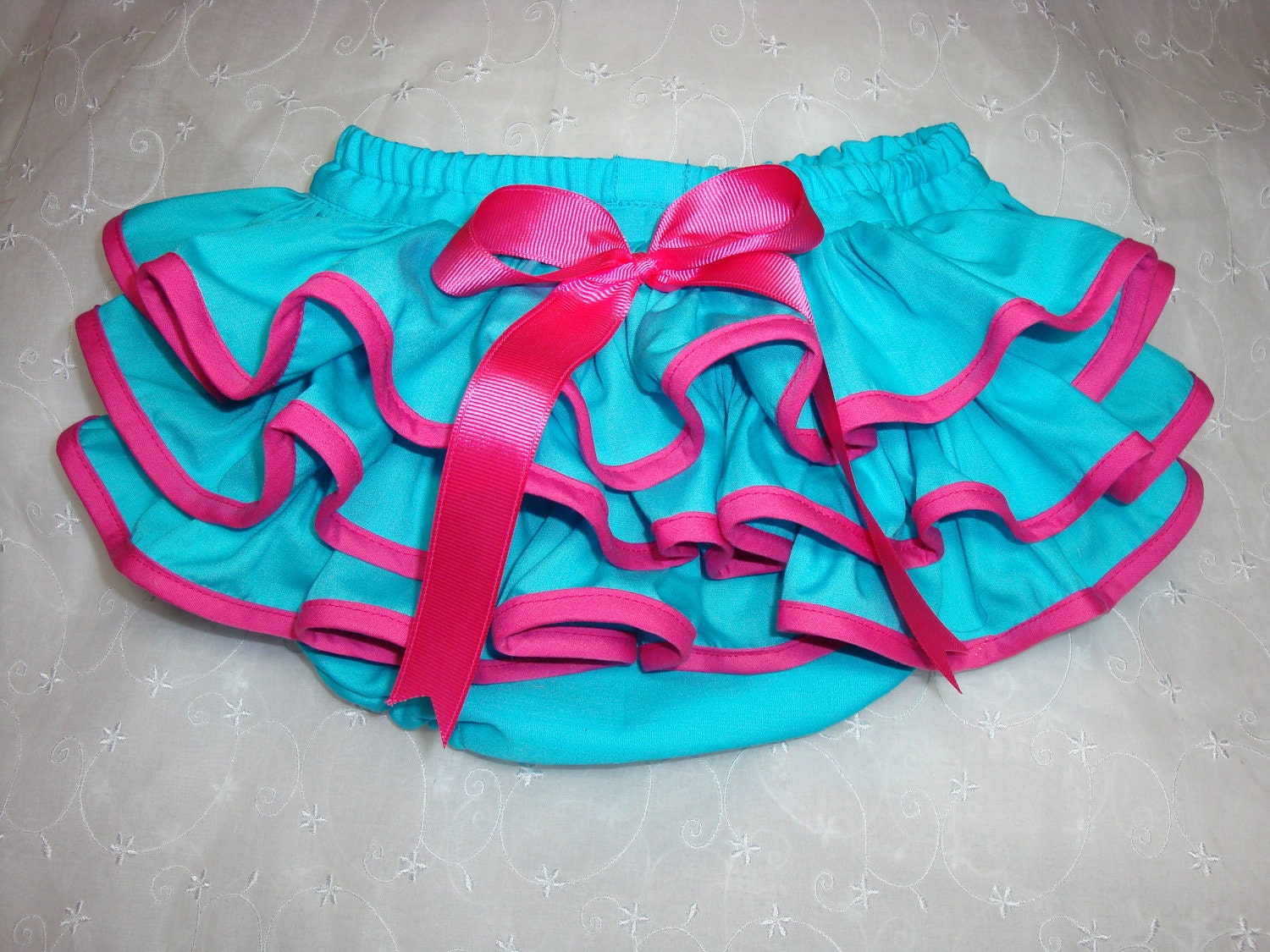 Little MISS ISABELLE Sassy, Fluffy Turquoise Aqua Ruffle Diaper Cover Bloomers Trimmed in Hot Pink Bias Edging by Bloomin Cuties