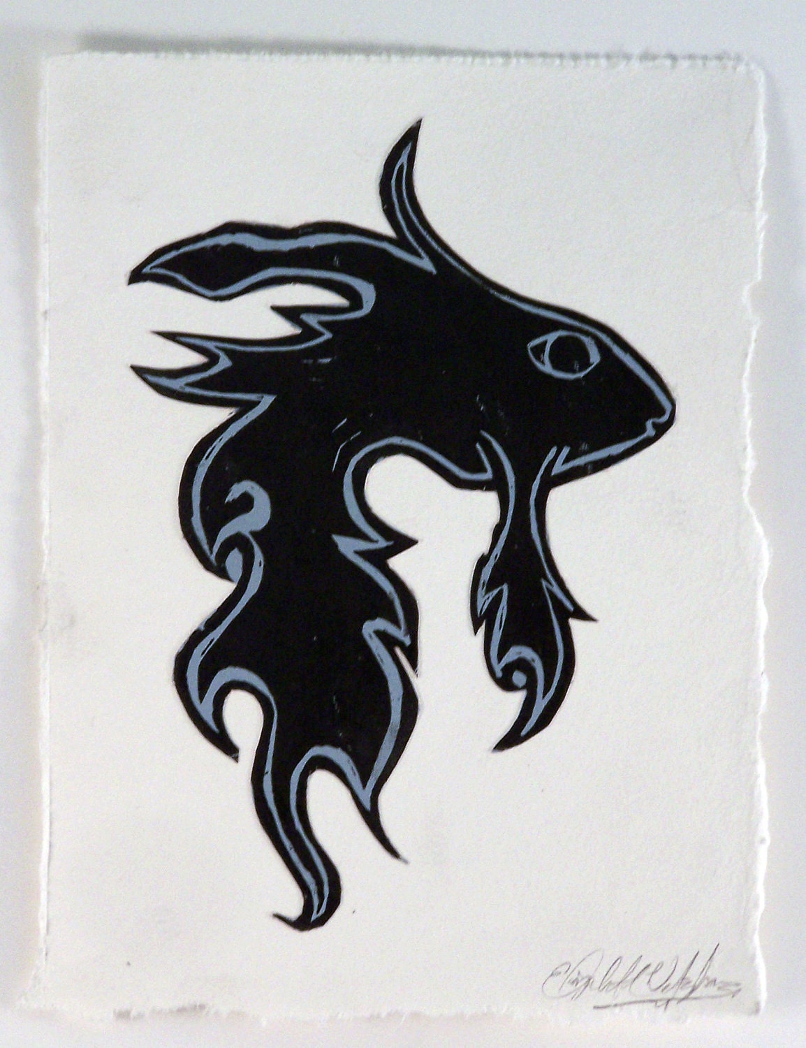 Abstracted fish, black and blue linocut