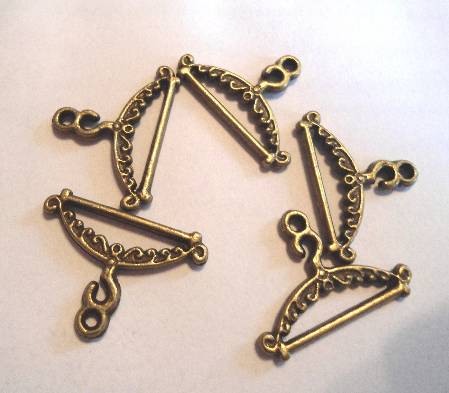 antique bronze clothes hanger charms (5)