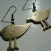 Antiqued gold tone bird earrings