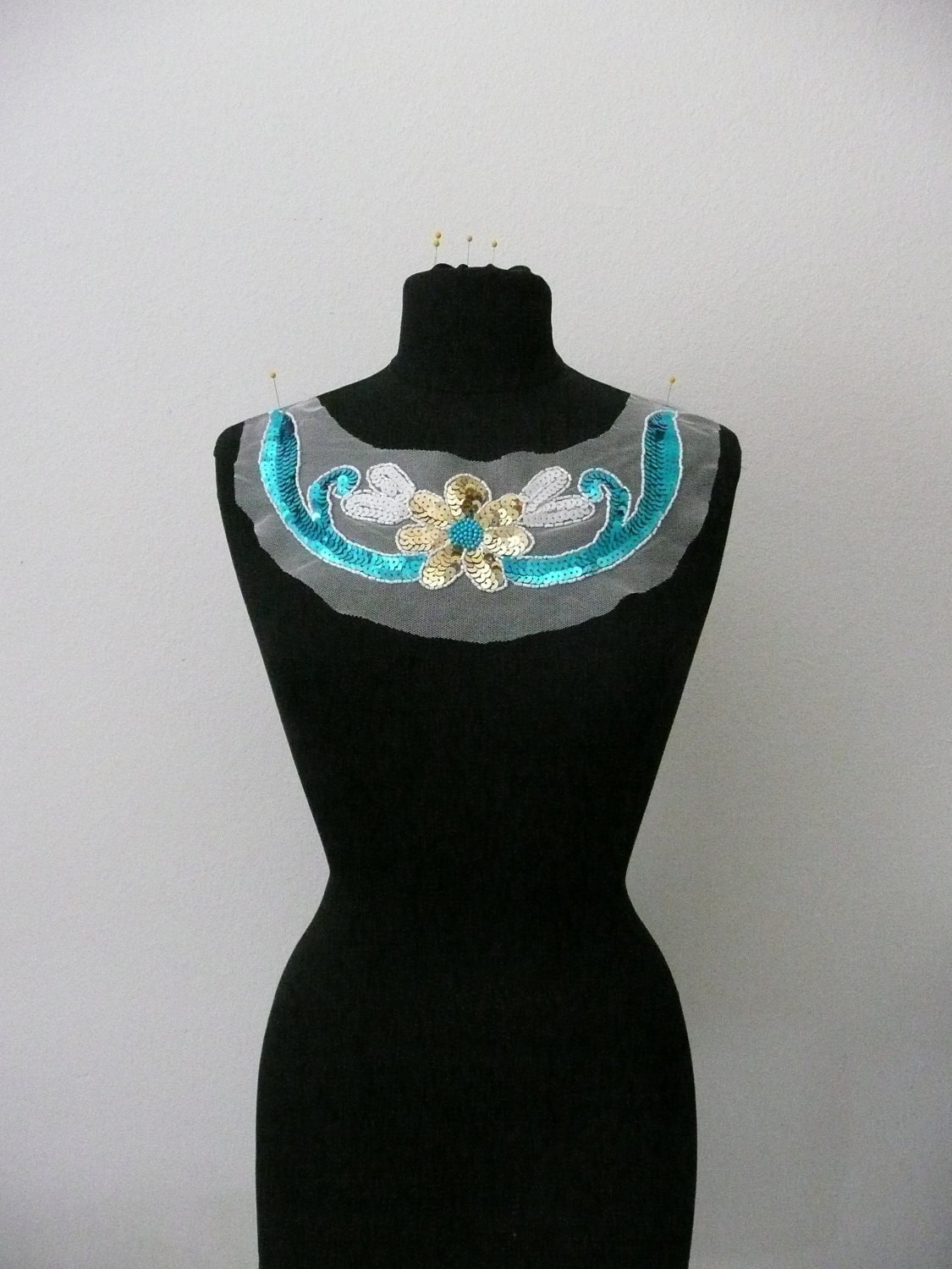 beautiful patch with one flower made of sequin beads blooming in the middle lace yoke applique trim.