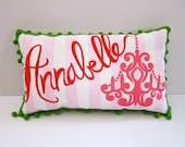 Baby pillow in light pink stripes with bright pink chandelier. Personalized with name.