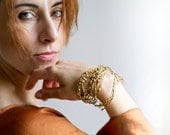 Golden cuff bracelet with drops