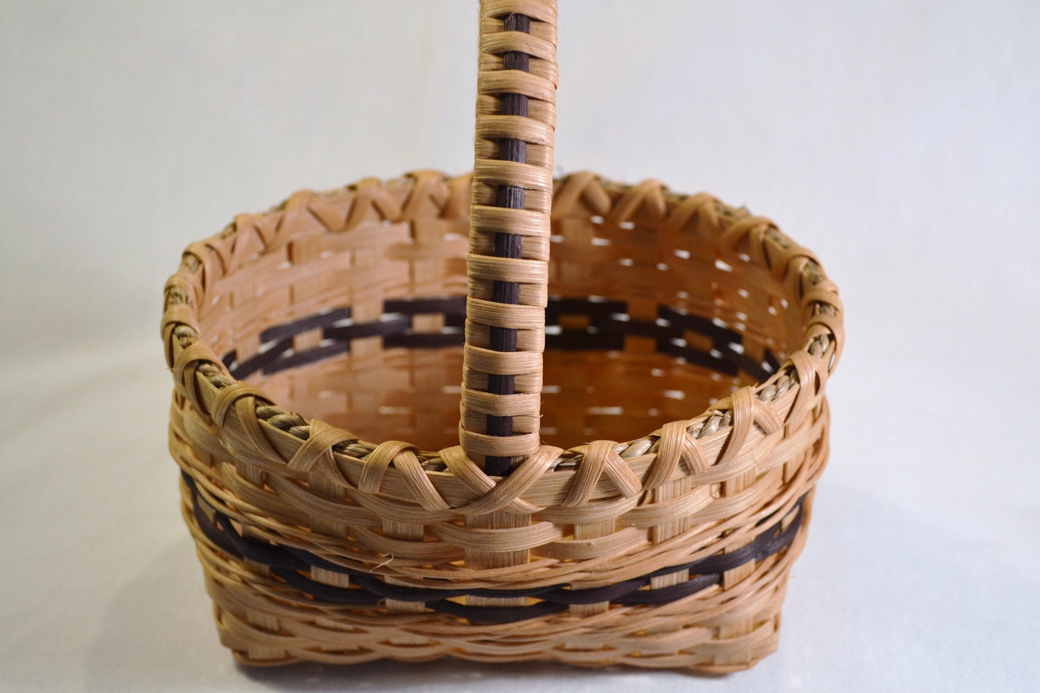 Small Handmade Reed or Wicker Basket with Black Accent for Flower Girl, Bath, or Table