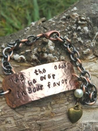The Hunger Games Stamped Bracelet - "May the Odds"
