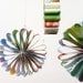 Vintage Picture Book hanging decos. Paper daisies for decorating your space.