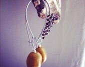 1   wire wrapped with smoky quartz with dangling mustard/yellow vintage lucite nugget