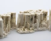 Square black box frame with ceramic.''Giants Causeway''