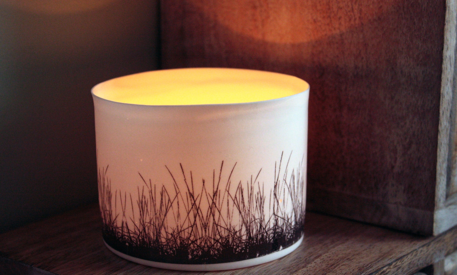 English fine white bone china vessel or tea light holder in stoneware with black grass motif.