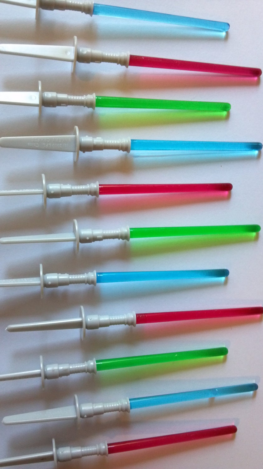 Star Wars Light Saber cupcake picks or cake toppers, great for your next boy or girl birthday space themed party or favor