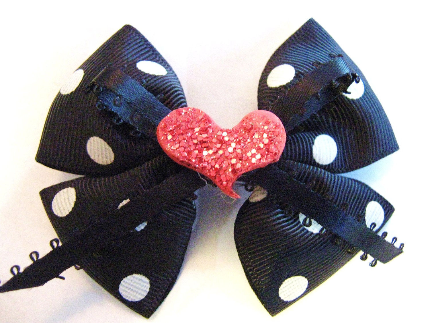 Queen of Hearts double bow in black and white polka dots