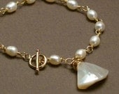 Oceana Gold Bracelet -- Mother of Pearl Shell Fan and Ivory Freshwater Pearls on 14k Goldfill