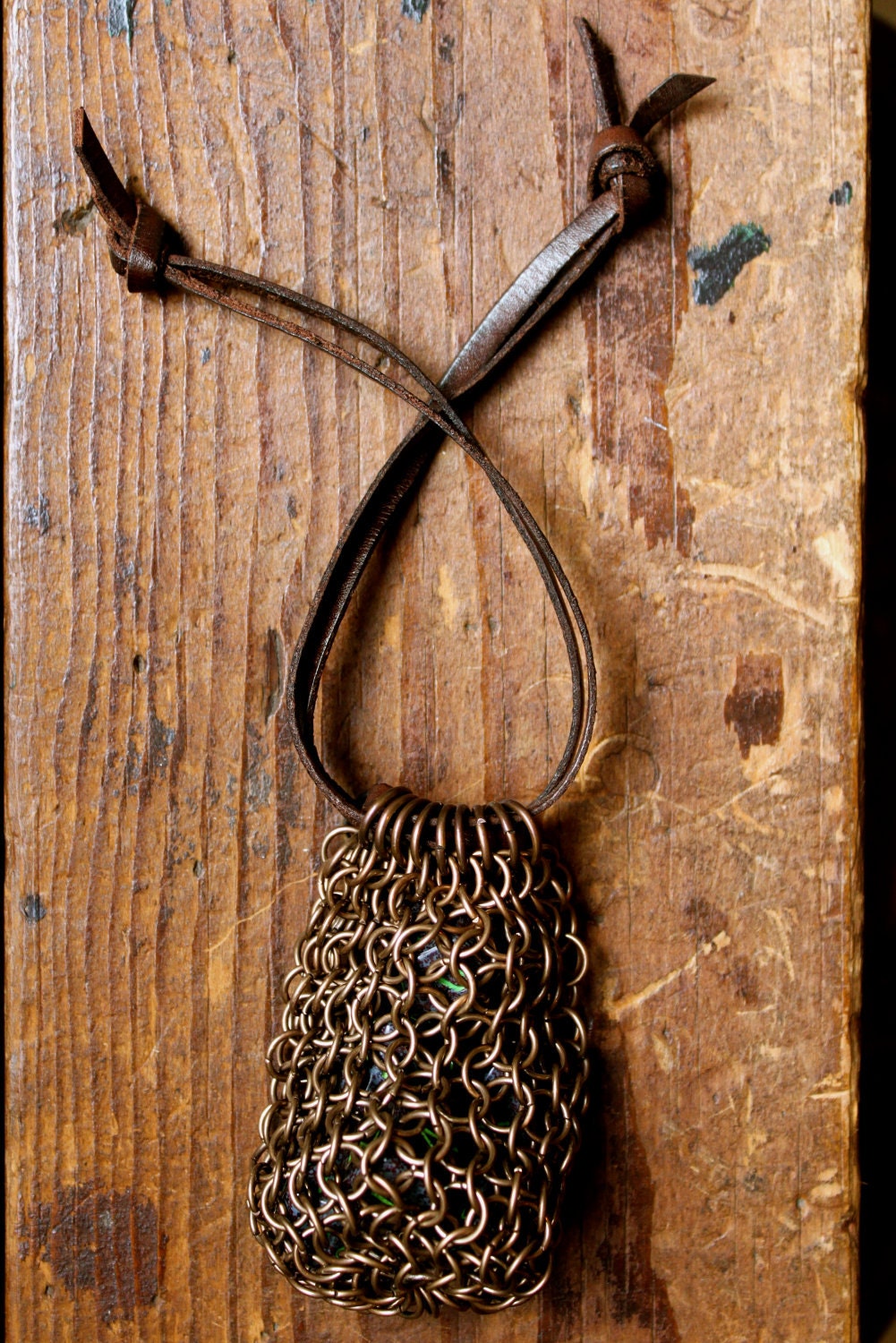bronze chainmaille dice bag with a leather strap