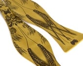 Beer bow tie. Golden yellow "lager" print. Screenprinted hops barley and wheat freestyle self-tie style.
