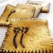 Felted coasters from upcycled wool sweater, Golden yellow and black, Embroidered Set of 4