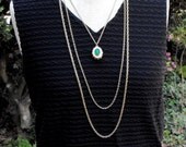 Gold Tone Three Strand Necklace with Green Pendant