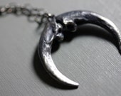 naja. owl talon crescent.