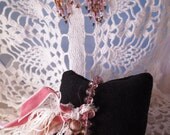 Stretch Bracelet rose color with large focal cream lace bead