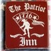 The Patriot Inn primitive wood sign