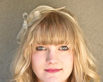 wedding headband with a vintage petal bow and pearls