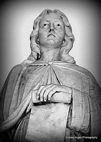 He sees. Matted photograph of statue