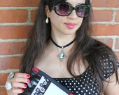 Bloomsbury Cache, white, black, pleather, red stitching, floral trim, clutch