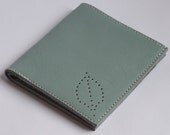 Eggshell leather wallet with floral lining and hand punched motif