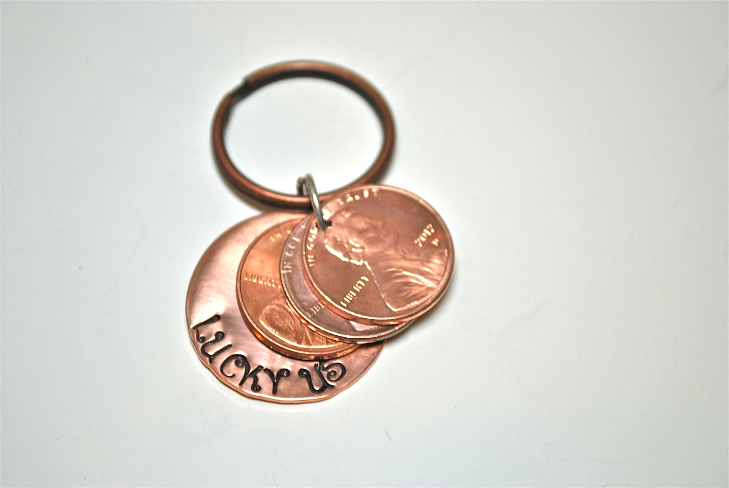 Hand stamped Lucky Us Copper Penny Key Chain with years of pennies