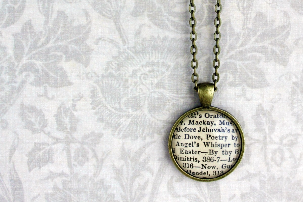 Easter words sheet music necklace.  Antiqued bronze pendant with real vintage words under glass dome.  Gift for book lover or musician