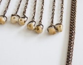 Skulls Amulet harness body chain necklace with tiny bone skulls beads