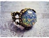 Blue Opal Round Glass Cabochon Ring with an Ornate Antique Brass Filigree Band