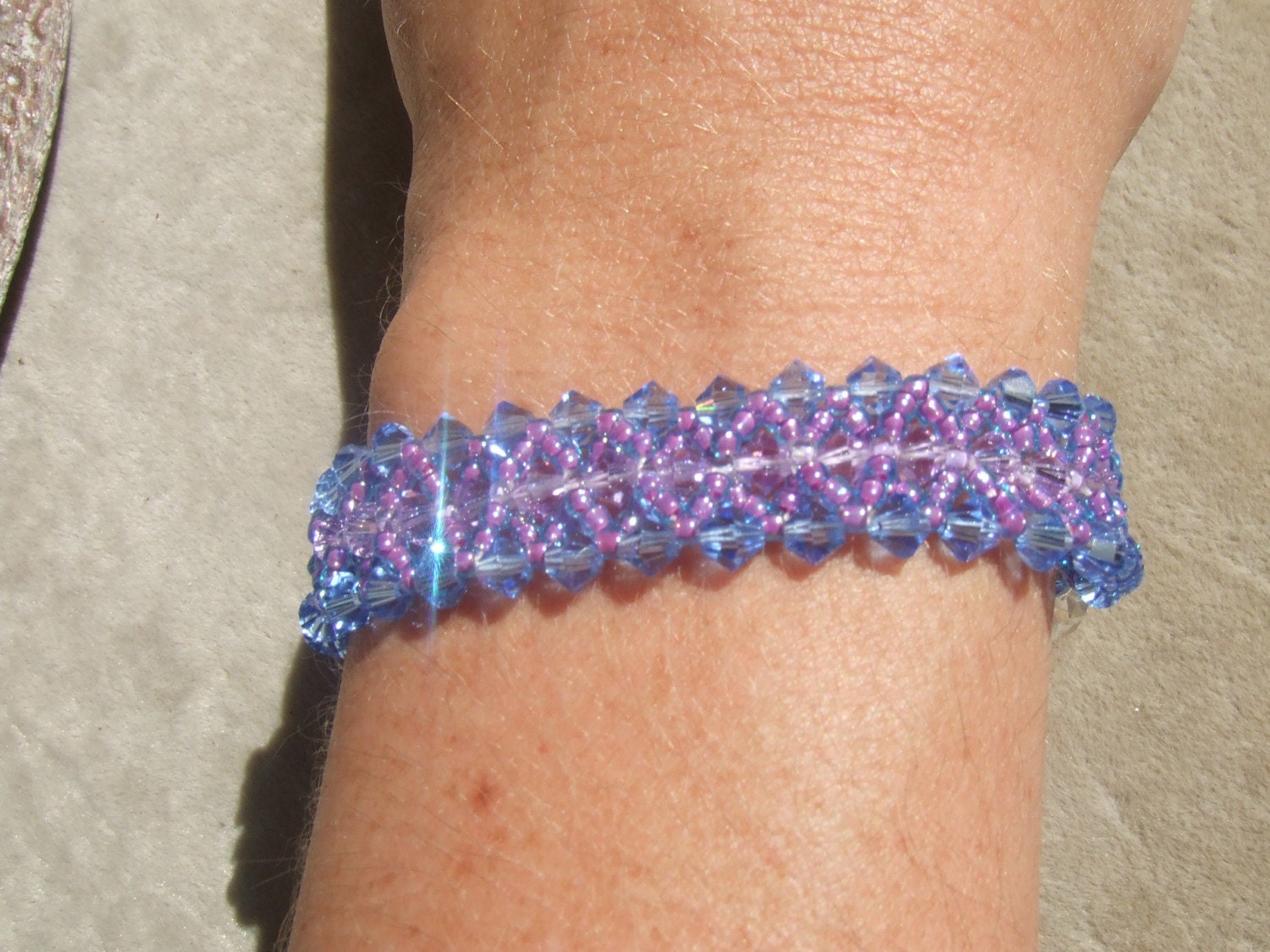 Blue and Purple Swarovski Crystal Bracelet . Seed Bead Woven . Cuff . Handmade. Iridescent Shine