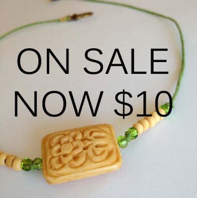ON SALE - Hemp Cord Necklace With Rectangular Carved Bone Flower Bead