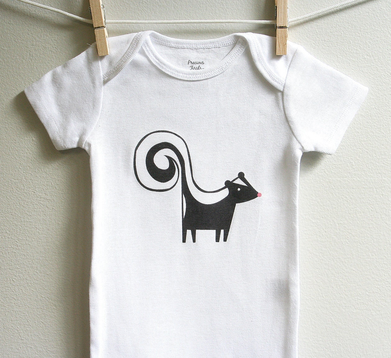 Baby boy clothes, skunk. Long or short sleeve. Your choice of size.