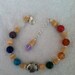 Rainbow Chakra Stones Adjustable Bracelet with Silver Fish Bead, Heishi Shell Beads and Pyramid Bead Pendulum