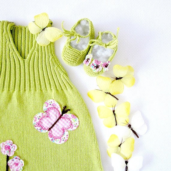 A knitted baby dress with flowers and butterflies in green-lime. 100% cotton. Newborn.