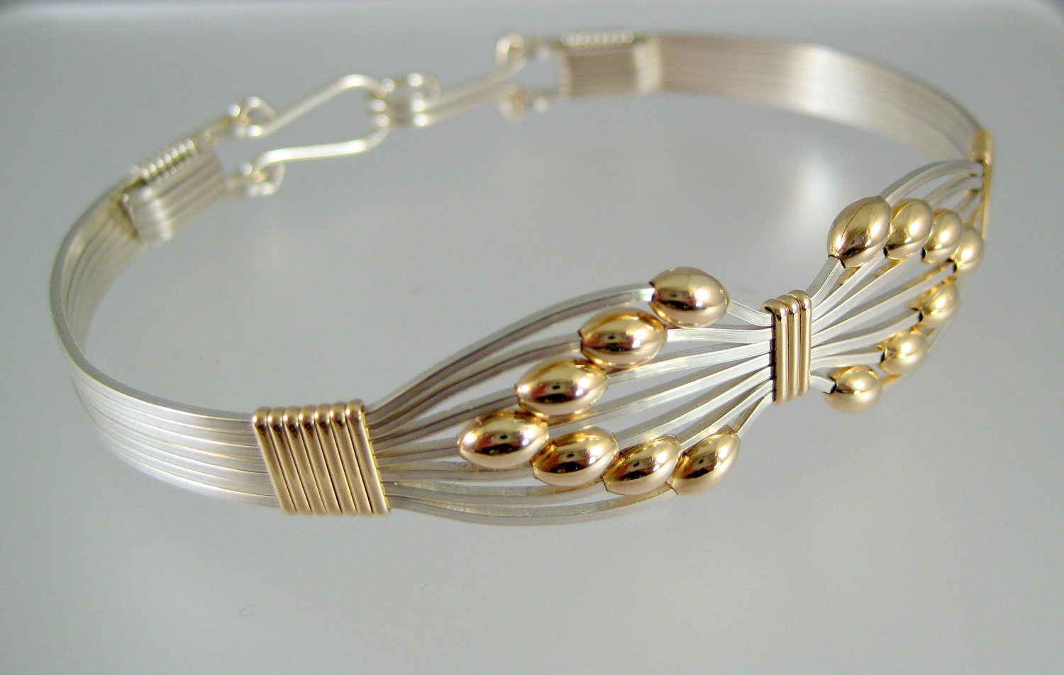 Two-tone wire wrapped bangle - argentium silver bangle with gold beads