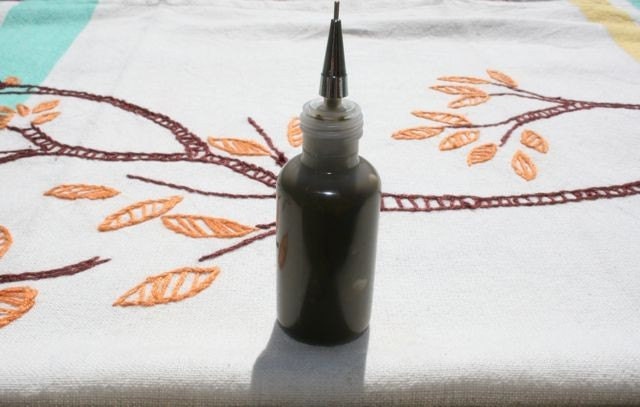 Henna paste made fresh in an applicator bottle for temporary tattoos