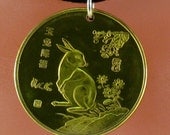 coin jewelry.  RABBIT COIN NECKLACE.  pendant . bunny. Hare . gold. year of rabbit. china No.001035